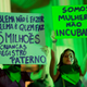 Women protest abortion laws this past June. The sign on the right reads “We are women, not incubators.”